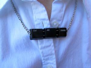 This CTRL ALT DELETE necklace is made of Win.